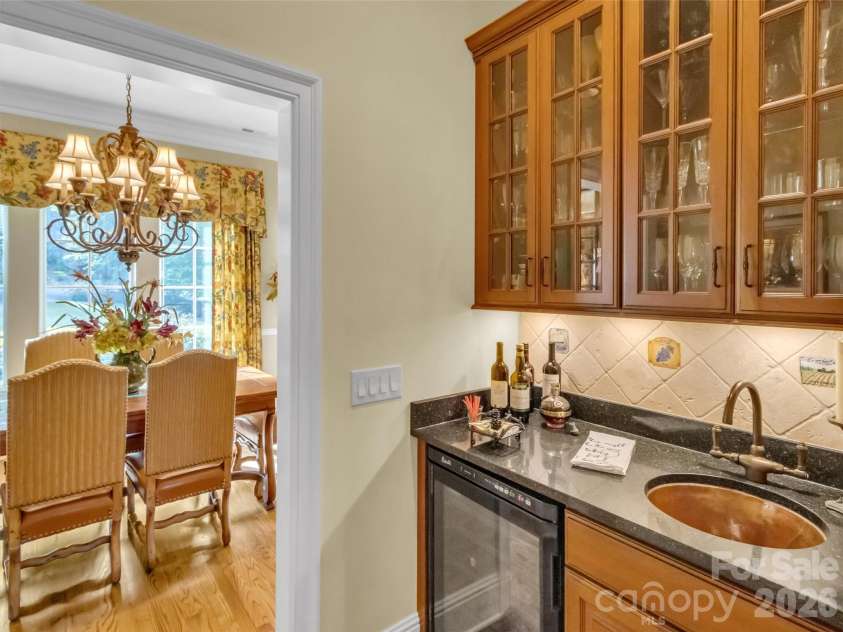 149 Cardinal Lane, Waynesville, NC 28786.  MLS# CAR4379628, YatesRealty ID 29452. Wet Bar Between Kitchen & Dining Room