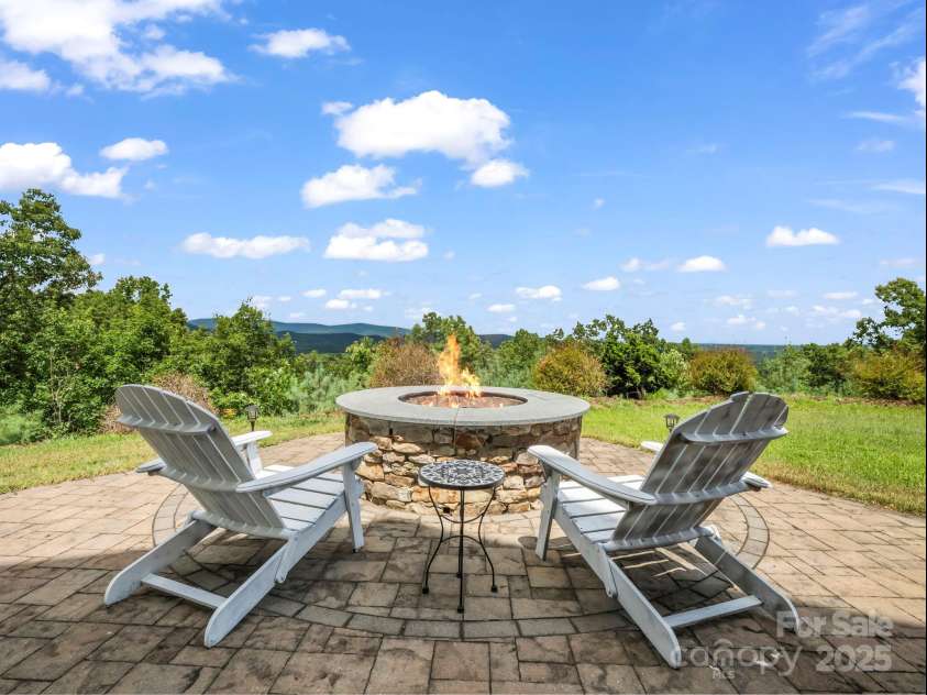 995 Towery Trace, Ellenboro, NC 28040.  MLS# CAR4287320, YatesRealty ID 29459. Firepit with a stunning view!