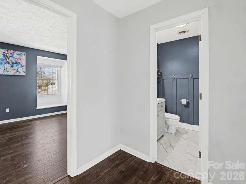 1409 Kensington Road, Hendersonville, NC 28791.  MLS# CAR4345772, YatesRealty ID 2946. Guest Bath, upper level, accessed from hallway, adjacent to Bedrooms