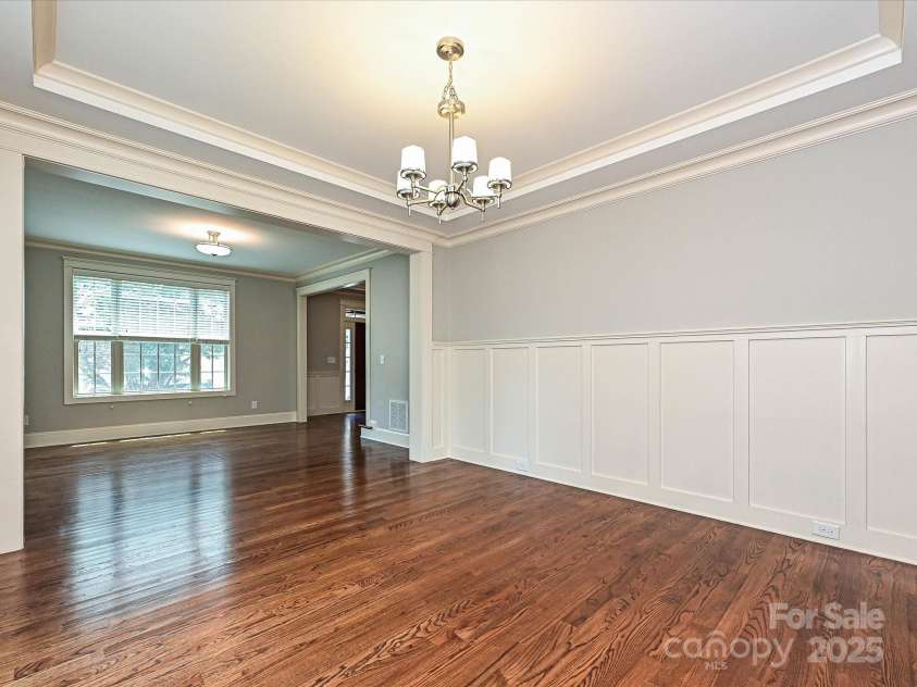 217 Hillandale Drive, Charlotte, NC 28270.  MLS# CAR4286921, YatesRealty ID 29464. Dining Room and Living Room