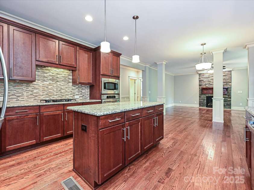 217 Hillandale Drive, Charlotte, NC 28270.  MLS# CAR4286921, YatesRealty ID 29464. Kitchen into Great Room
