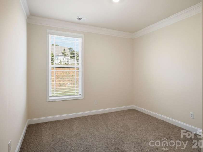125 Saidin Lane, Troutman, NC 28166.  MLS# CAR4390174, YatesRealty ID 29465. Main Floor Bedroom