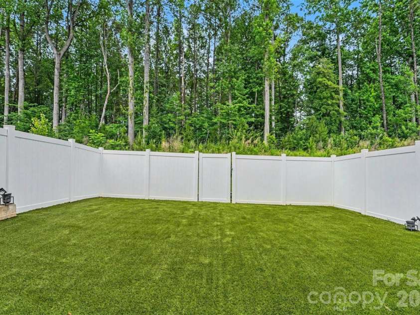 8216 Merryvale Lane, Charlotte, NC 28214.  MLS# CAR4390005, YatesRealty ID 29466. Private Backyard