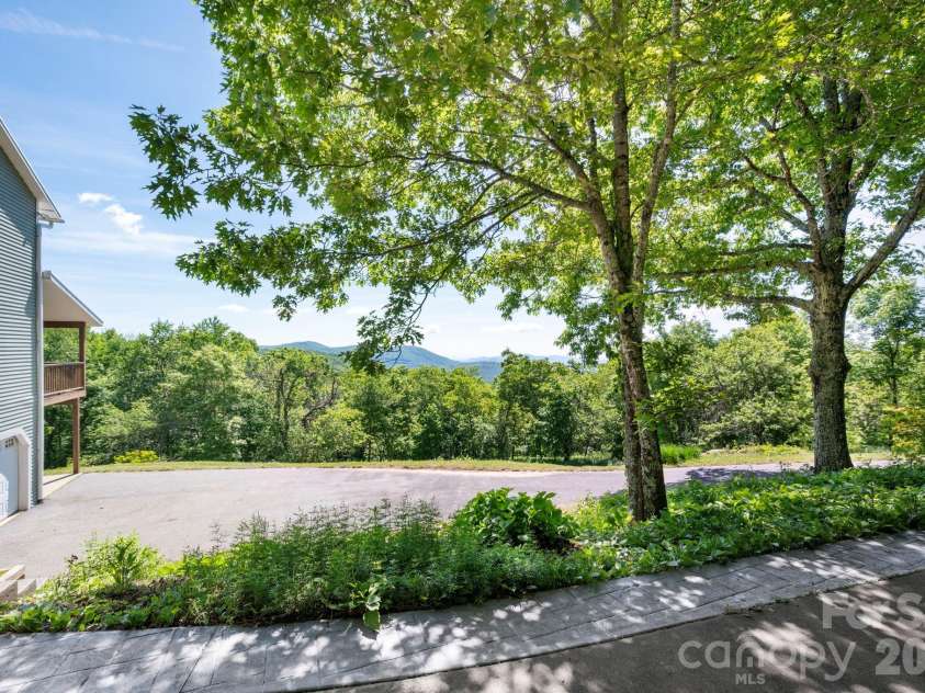 58 Randall Drive, Fairview, NC 28730.  MLS# CAR4388685, YatesRealty ID 29473. 