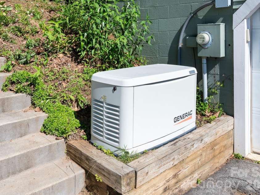58 Randall Drive, Fairview, NC 28730.  MLS# CAR4388685, YatesRealty ID 29473. Backup Propane Generator