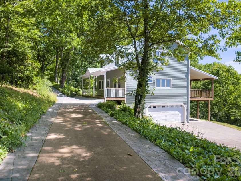 58 Randall Drive, Fairview, NC 28730.  MLS# CAR4388685, YatesRealty ID 29473. Concrete Driveway