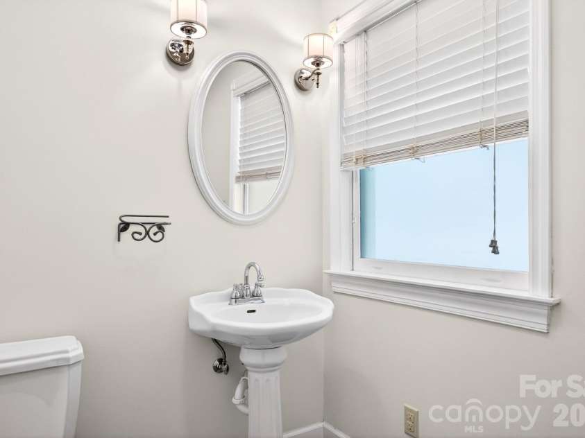 58 Randall Drive, Fairview, NC 28730.  MLS# CAR4388685, YatesRealty ID 29473. Half Bathroom on the Main Level