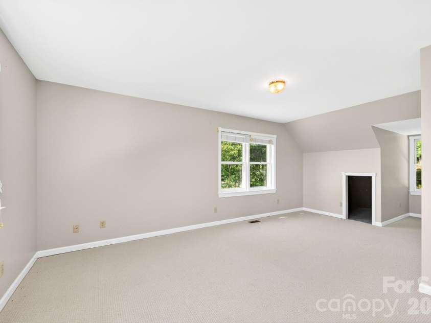 58 Randall Drive, Fairview, NC 28730.  MLS# CAR4388685, YatesRealty ID 29473. Large Bedroom