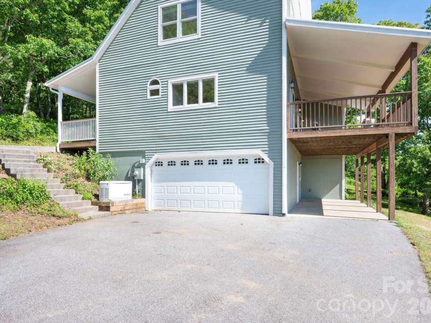 58 Randall Drive, Fairview, NC 28730.  MLS# CAR4388685, YatesRealty ID 29473. Two Car Garage