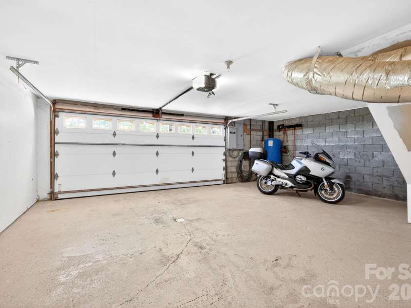 58 Randall Drive, Fairview, NC 28730.  MLS# CAR4388685, YatesRealty ID 29473. Two Car Garage 