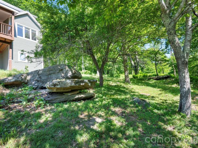58 Randall Drive, Fairview, NC 28730.  MLS# CAR4388685, YatesRealty ID 29473. View From Below the Home