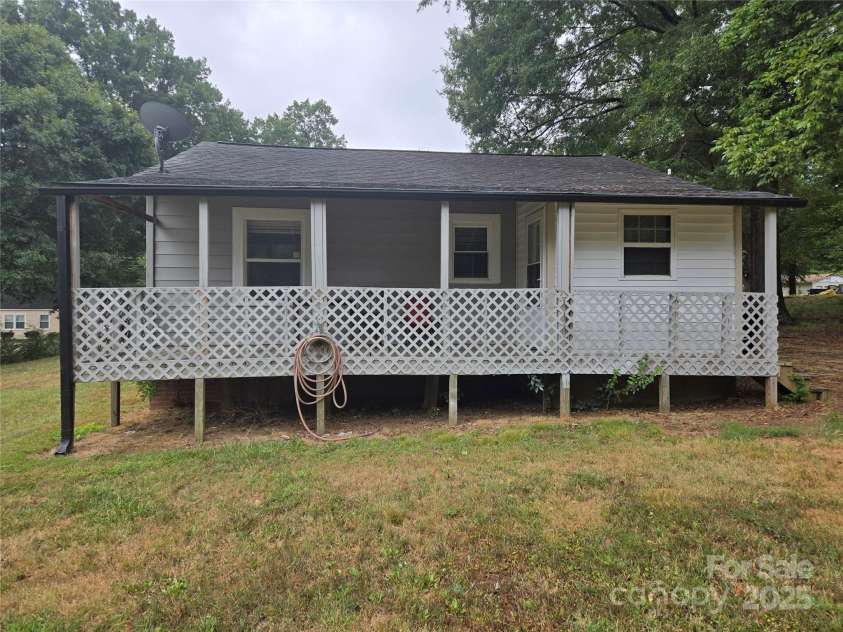 105 Eastside Drive, Concord, NC 28027.  MLS# CAR4287741, YatesRealty ID 29474. Back of Home