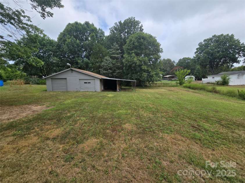 105 Eastside Drive, Concord, NC 28027.  MLS# CAR4287741, YatesRealty ID 29474. Back Yard View
