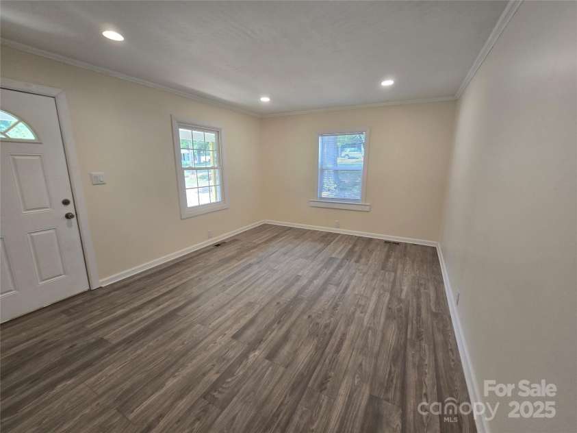 105 Eastside Drive, Concord, NC 28027.  MLS# CAR4287741, YatesRealty ID 29474. Living Room