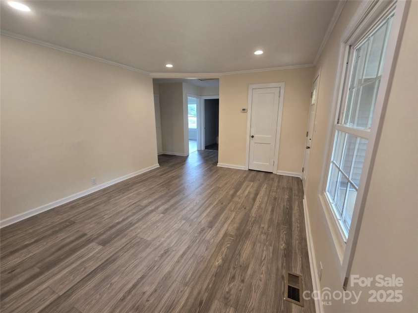 105 Eastside Drive, Concord, NC 28027.  MLS# CAR4287741, YatesRealty ID 29474. Living Room