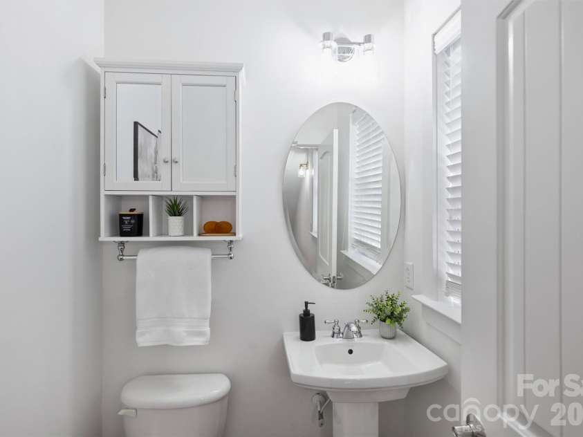 1916 Lela Avenue, Charlotte, NC 28208.  MLS# CAR4375343, YatesRealty ID 29478. Powder bath - second level