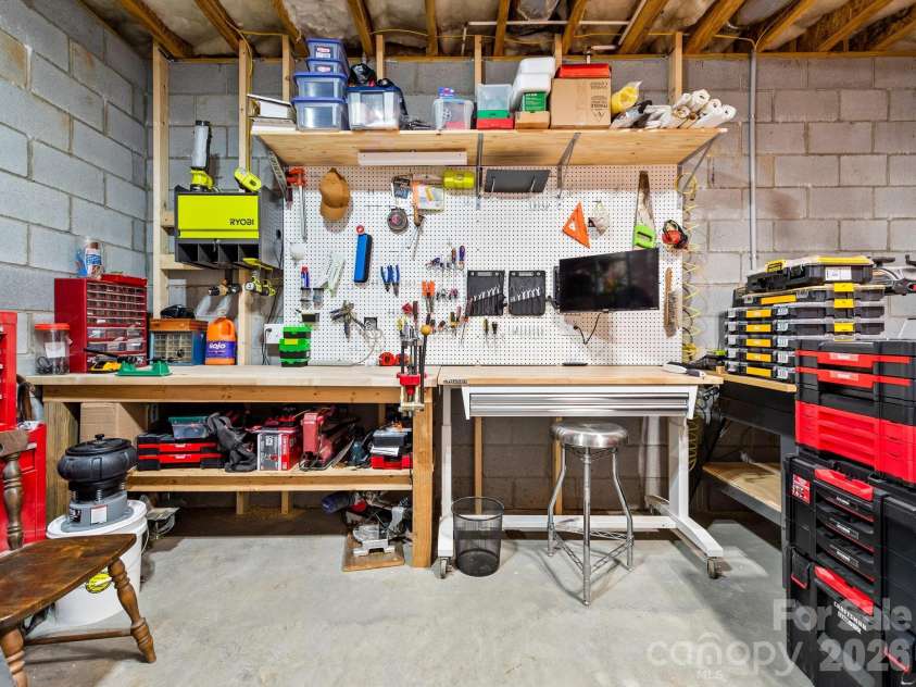 156 Dogwood Drive, Weaverville, NC 28787.  MLS# CAR4384835, YatesRealty ID 29479. Lower Level Workshop