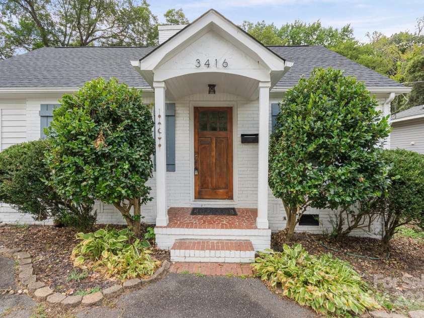 3416 Commonwealth Avenue, Charlotte, NC 28205.  MLS# CAR4286879, YatesRealty ID 29480. Beautiful Wood Front Door