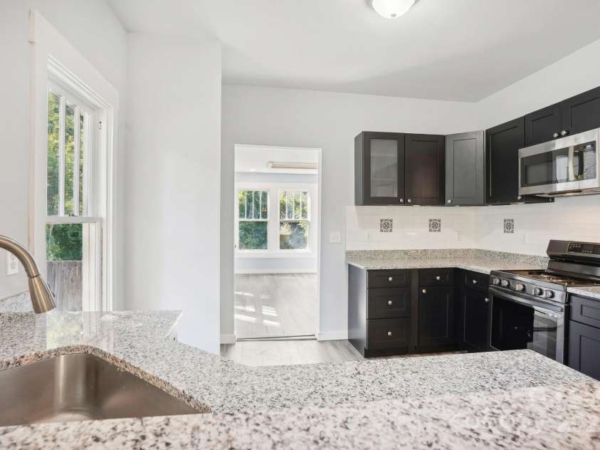 705 Lancaster Avenue, Monroe, NC 28112.  MLS# CAR4288076, YatesRealty ID 29487. KITCHEN