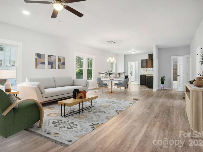 705 Lancaster Avenue, Monroe, NC 28112.  MLS# CAR4288076, YatesRealty ID 29487. LIV RM - REPRESENTATION