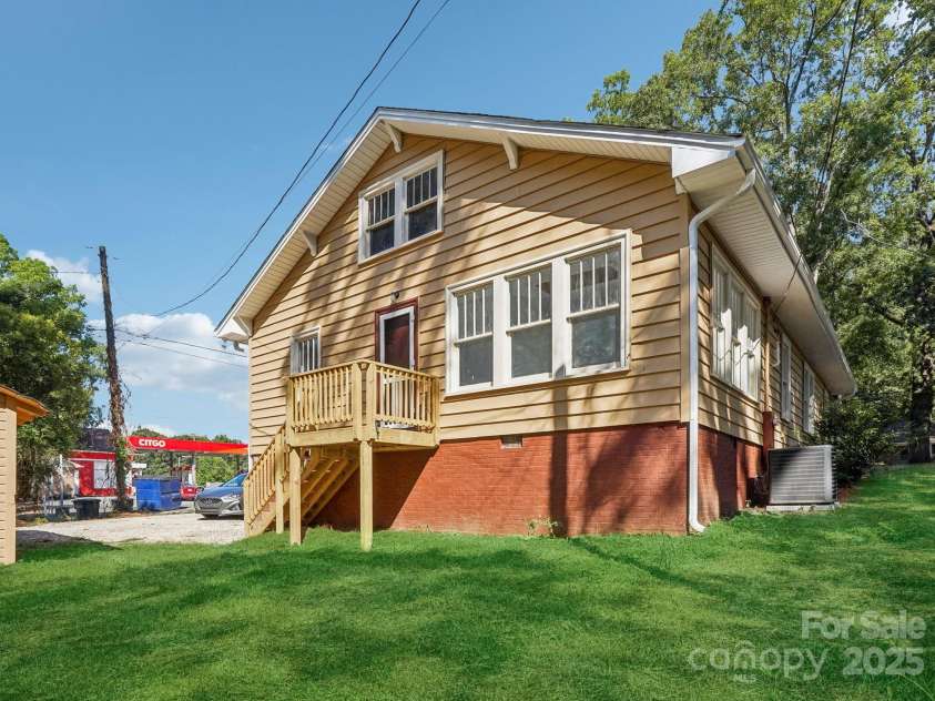 705 Lancaster Avenue, Monroe, NC 28112.  MLS# CAR4288076, YatesRealty ID 29487. REAR (before Fence)