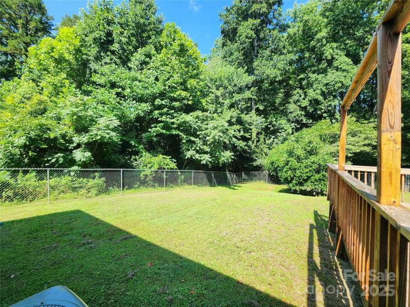 125 Circle Drive, Mount Holly, NC 28120.  MLS# CAR4276850, YatesRealty ID 29490. Fenced back yard