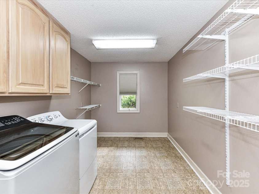 7963 Prestwick Lane, Stanley, NC 28164.  MLS# CAR4283609, YatesRealty ID 29492. Laundry