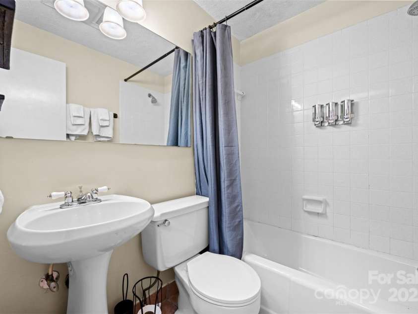 321 Charter Hills Road, Beech Mountain, NC 28604.  MLS# CAR4276469, YatesRealty ID 29495. Guest bathroom 1