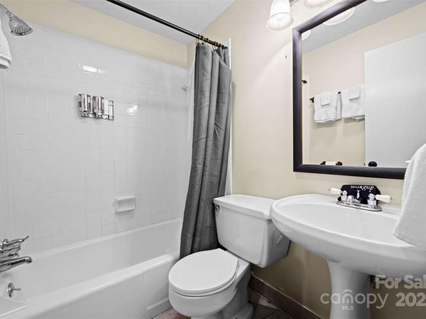 321 Charter Hills Road, Beech Mountain, NC 28604.  MLS# CAR4276469, YatesRealty ID 29495. Guest bathroom 2