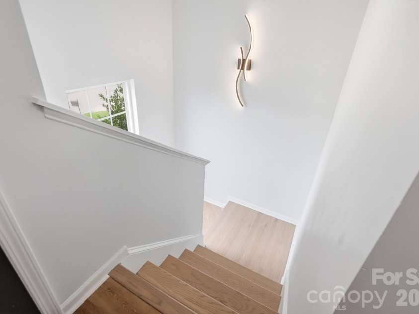 3625 Bullard Street, Charlotte, NC 28208.  MLS# CAR4387387, YatesRealty ID 29495. Staircase down