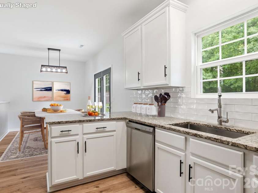 3625 Bullard Street, Charlotte, NC 28208.  MLS# CAR4387387, YatesRealty ID 29495. Virtually Staged / Kitchen to Dining Room