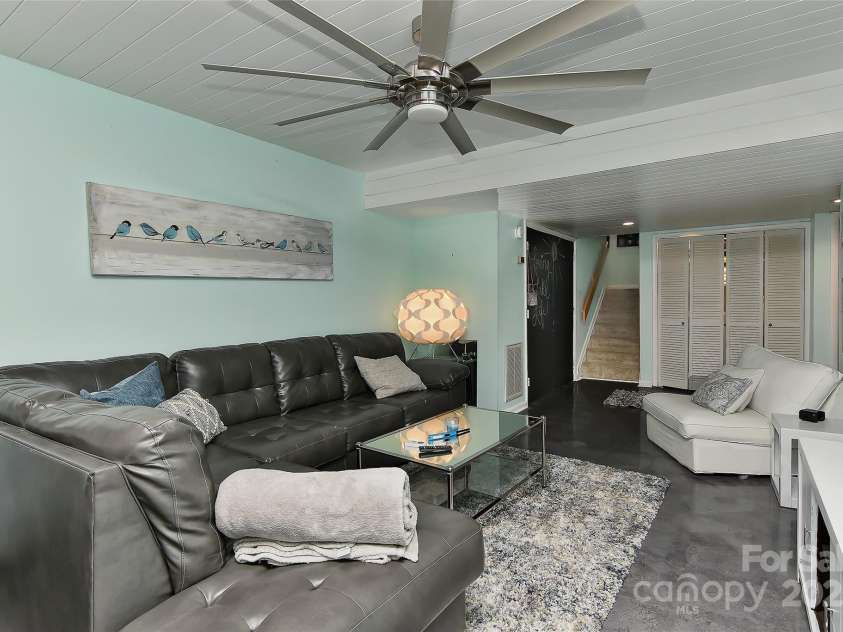 51 Old Post Road, Lake Wylie, SC 29710.  MLS# CAR4207674, YatesRealty ID 2950. Another view of family-living room in basement that offers tons of extra living space.