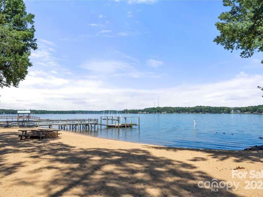 51 Old Post Road, Lake Wylie, SC 29710.  MLS# CAR4207674, YatesRealty ID 2950. Community beach and its a close walk on a path from Old Post.