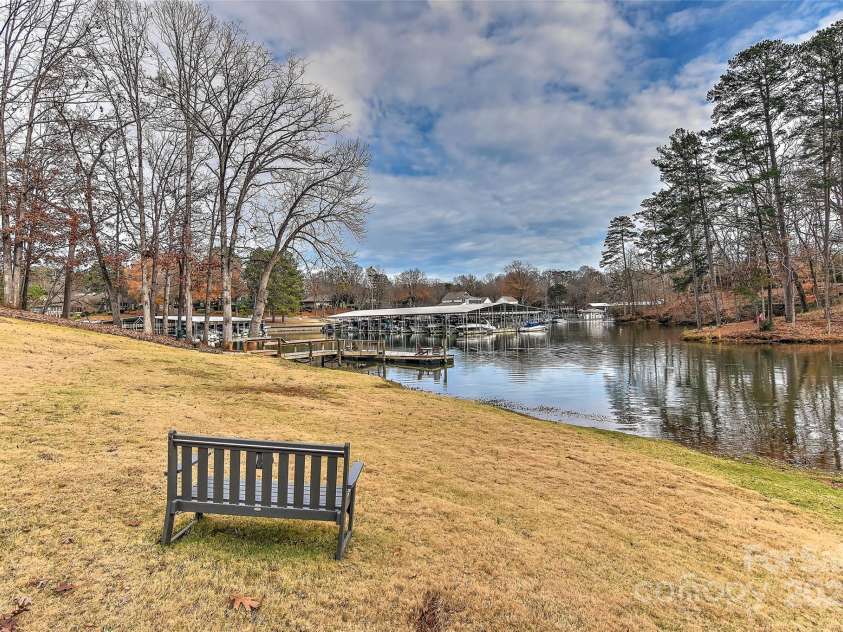51 Old Post Road, Lake Wylie, SC 29710.  MLS# CAR4207674, YatesRealty ID 2950. Community bench to sit, relax, chill and /or watch sunrises to boats or just the water!