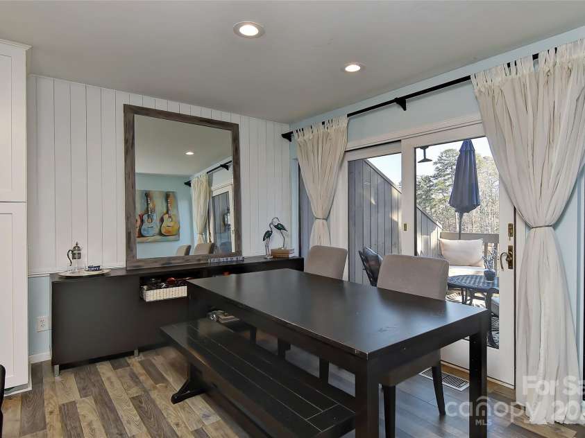 51 Old Post Road, Lake Wylie, SC 29710.  MLS# CAR4207674, YatesRealty ID 2950. Open dining room and doors leading to awesome deck over looking Lake Wylie!