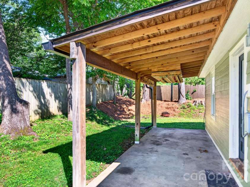 440 Carolina Avenue, Brevard, NC 28712.  MLS# CAR4390978, YatesRealty ID 29504. Covered Rear Patio