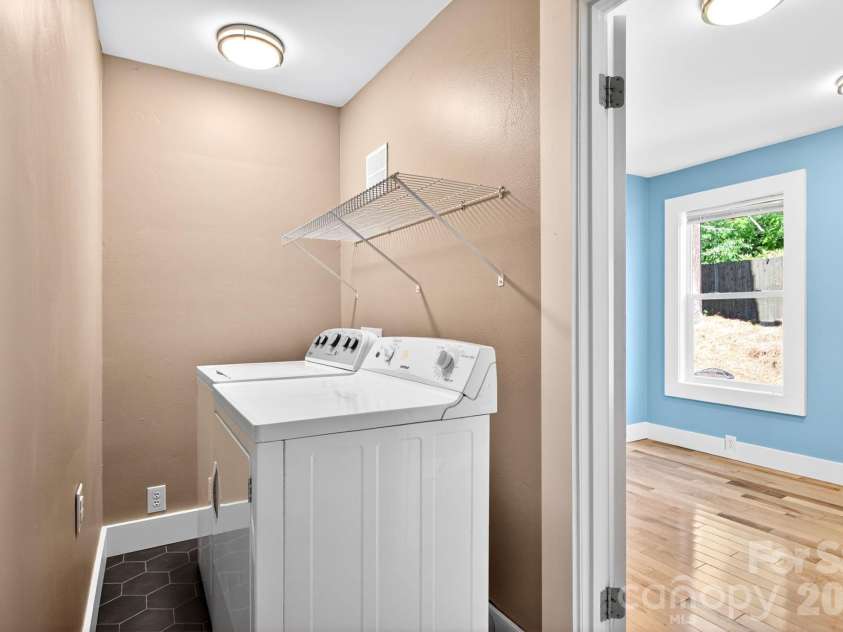 440 Carolina Avenue, Brevard, NC 28712.  MLS# CAR4390978, YatesRealty ID 29504. Main-Level Laundry Area