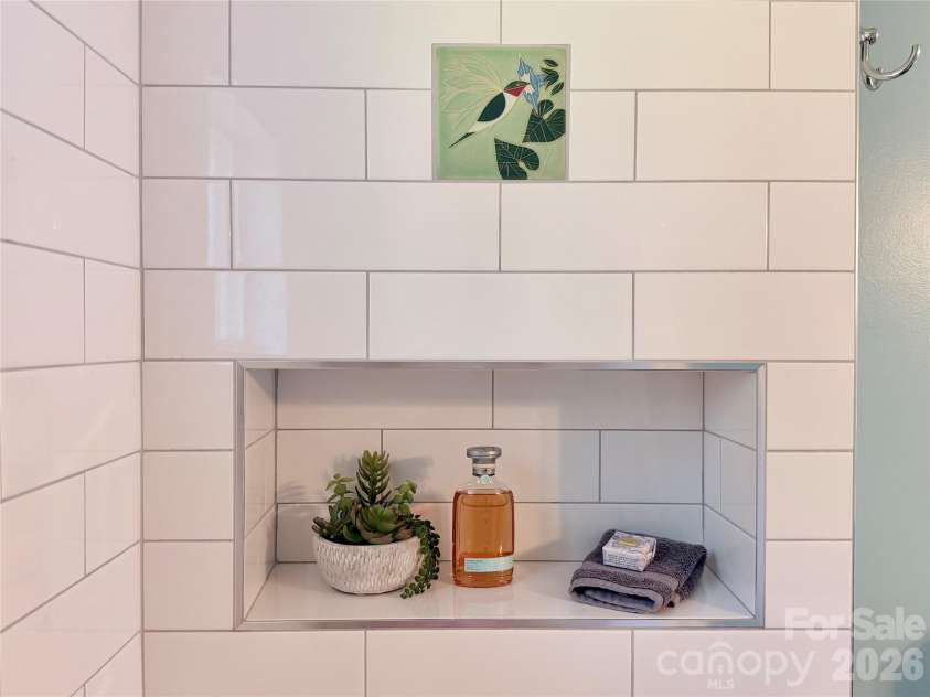 440 Carolina Avenue, Brevard, NC 28712.  MLS# CAR4390978, YatesRealty ID 29504. Shower Niche