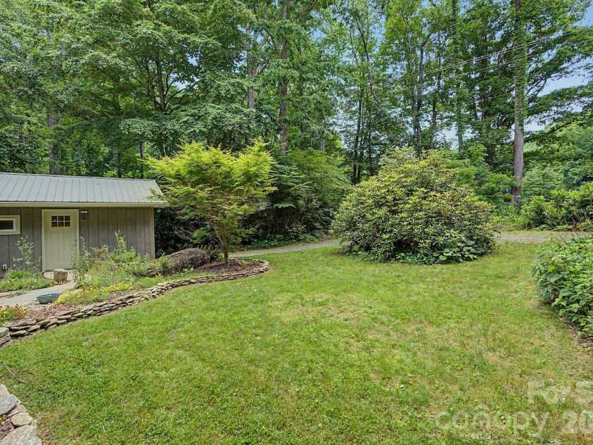 878 Garren Creek Road, Fairview, NC 28730.  MLS# CAR4387190, YatesRealty ID 29506. Flat Front Yard