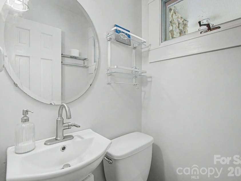 878 Garren Creek Road, Fairview, NC 28730.  MLS# CAR4387190, YatesRealty ID 29506. Half Bath