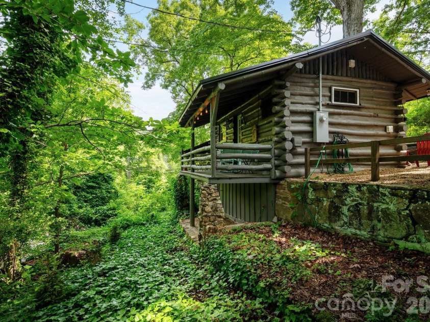 16 Cottage Drive, Asheville, NC 28805.  MLS# CAR4391836, YatesRealty ID 29507. Great Covered Deck Surrounded by Greenery