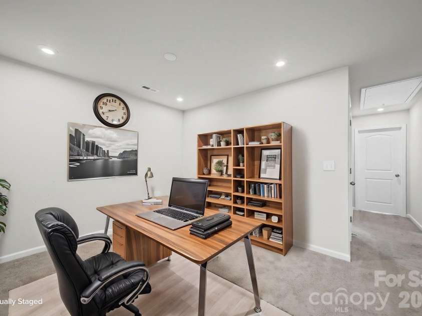 1211 Bigelow Street, Charlotte, NC 28269.  MLS# CAR4413102, YatesRealty ID 29509. Loft virtually staged as an office