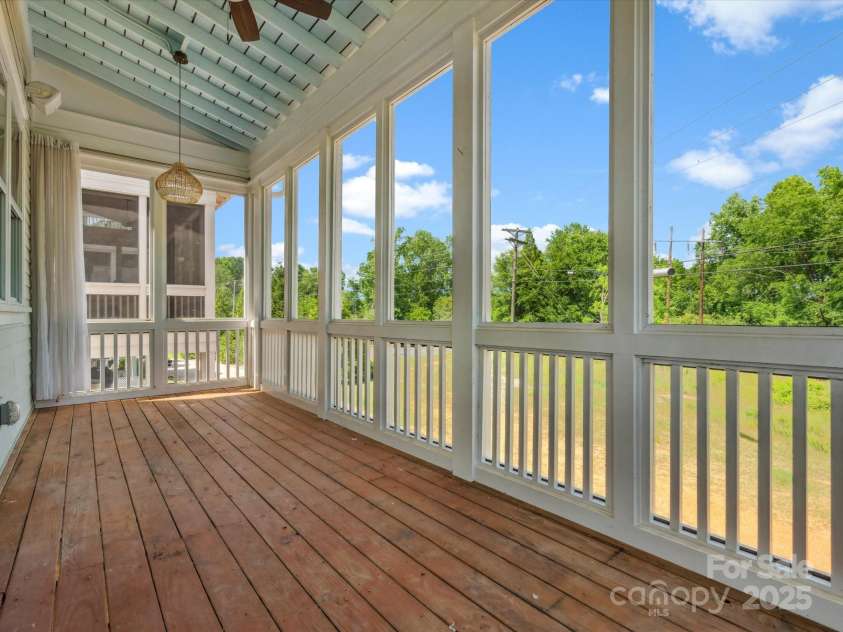 807 Herrons Ferry Road, Rock Hill, SC 29730.  MLS# CAR4263861, YatesRealty ID 29511. Covered porch leads to deck as well off the living room