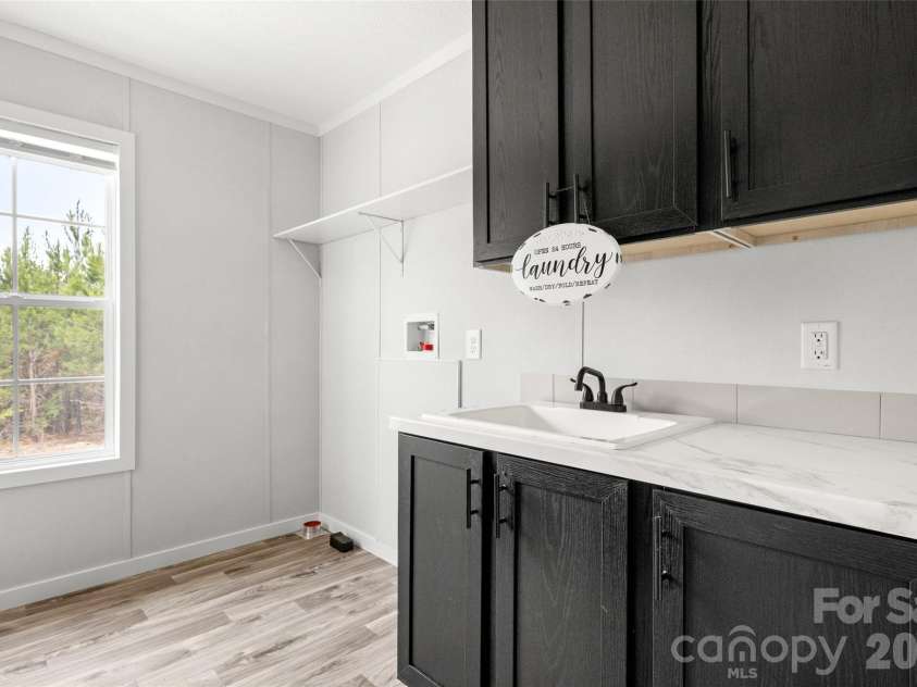 832 Jack Bone Hill Road, Jefferson, SC 29718.  MLS# CAR4391541, YatesRealty ID 29511. Spacious Laundry Room / Build Ins 