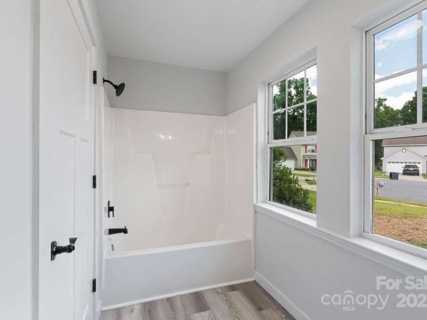 4231 RED SHED Lane, Charlotte, NC 28269.  MLS# CAR4287385, YatesRealty ID 29515. Master bath
