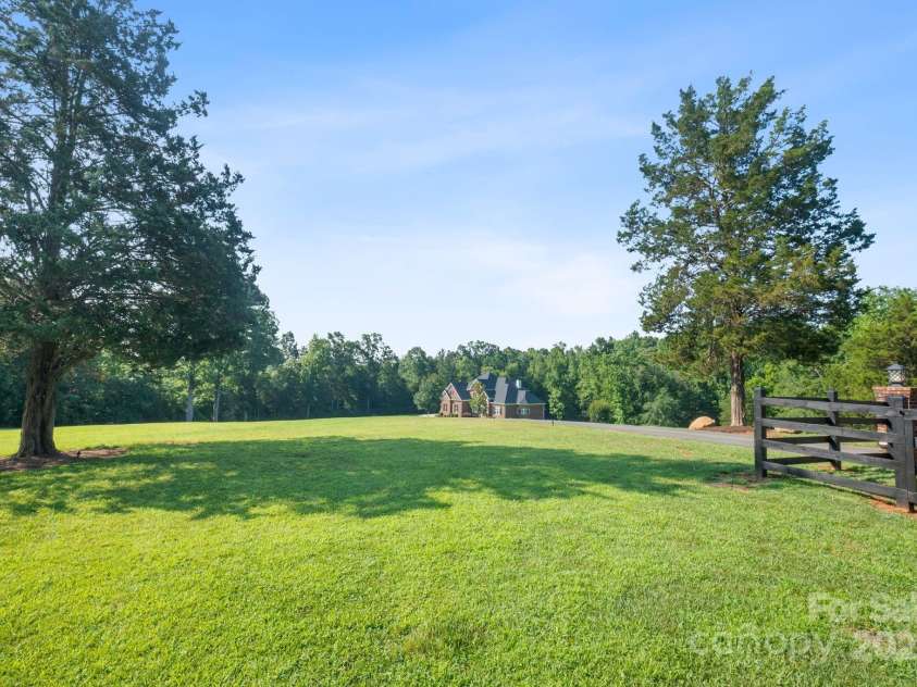 4660 Sugar Plum Lane, Davidson, NC 28036.  MLS# CAR4273062, YatesRealty ID 29516. Plenty of room for farm animals, dogs and pickleball