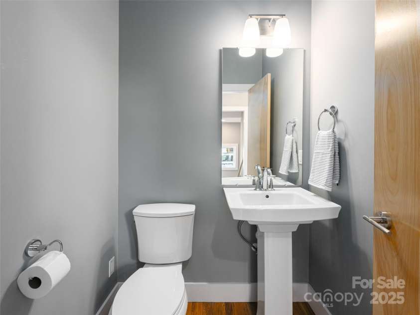 7 Mauricet Lane, Asheville, NC 28806.  MLS# CAR4241872, YatesRealty ID 2952. Half bath off kitchen