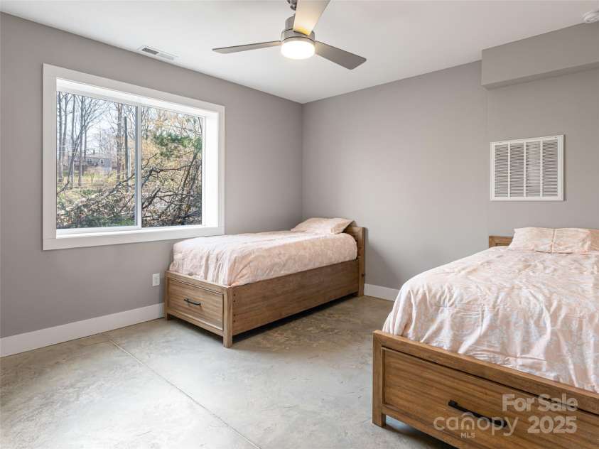 7 Mauricet Lane, Asheville, NC 28806.  MLS# CAR4241872, YatesRealty ID 2952. Lower level - second primary bedroom