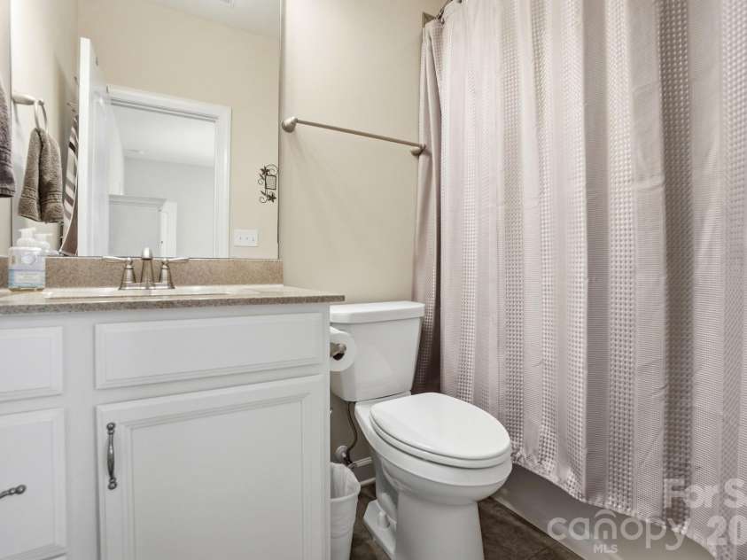 1385 Cilantro Court, Tega Cay, SC 29708.  MLS# CAR4391171, YatesRealty ID 29526. Downstairs Full Bathroom