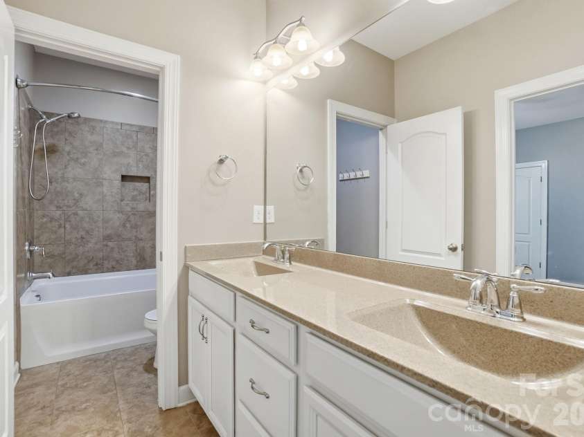 1385 Cilantro Court, Tega Cay, SC 29708.  MLS# CAR4391171, YatesRealty ID 29526. Full Jack & Jill Bathroom